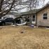 Flight makes emergency landing after parts of aircraft drop over homes