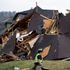 Eight tornadoes tear through Alabama, killing five people and leaving 35,000 without power