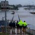 Towns cut off and 18,000 people evacuated as downpours intensify in Australia