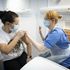 Half of UK adults have received first COVID vaccine dose, health secretary says