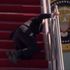 Joe Biden ‘just fine’ after falling up stairs while boarding Air Force One