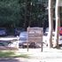 Man arrested after woman's body found in water in country park