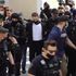 Greek man in court wearing bulletproof vest as he is charged with murder of British wife