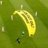 Climate protester parachutes on to pitch at Euro 2020 game