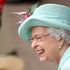 Queen waves to the crowd as she arrives at Royal Ascot to cheer on four of her horses