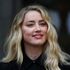 Amber Heard names new dog after Australian minister she feuded with in 2015
